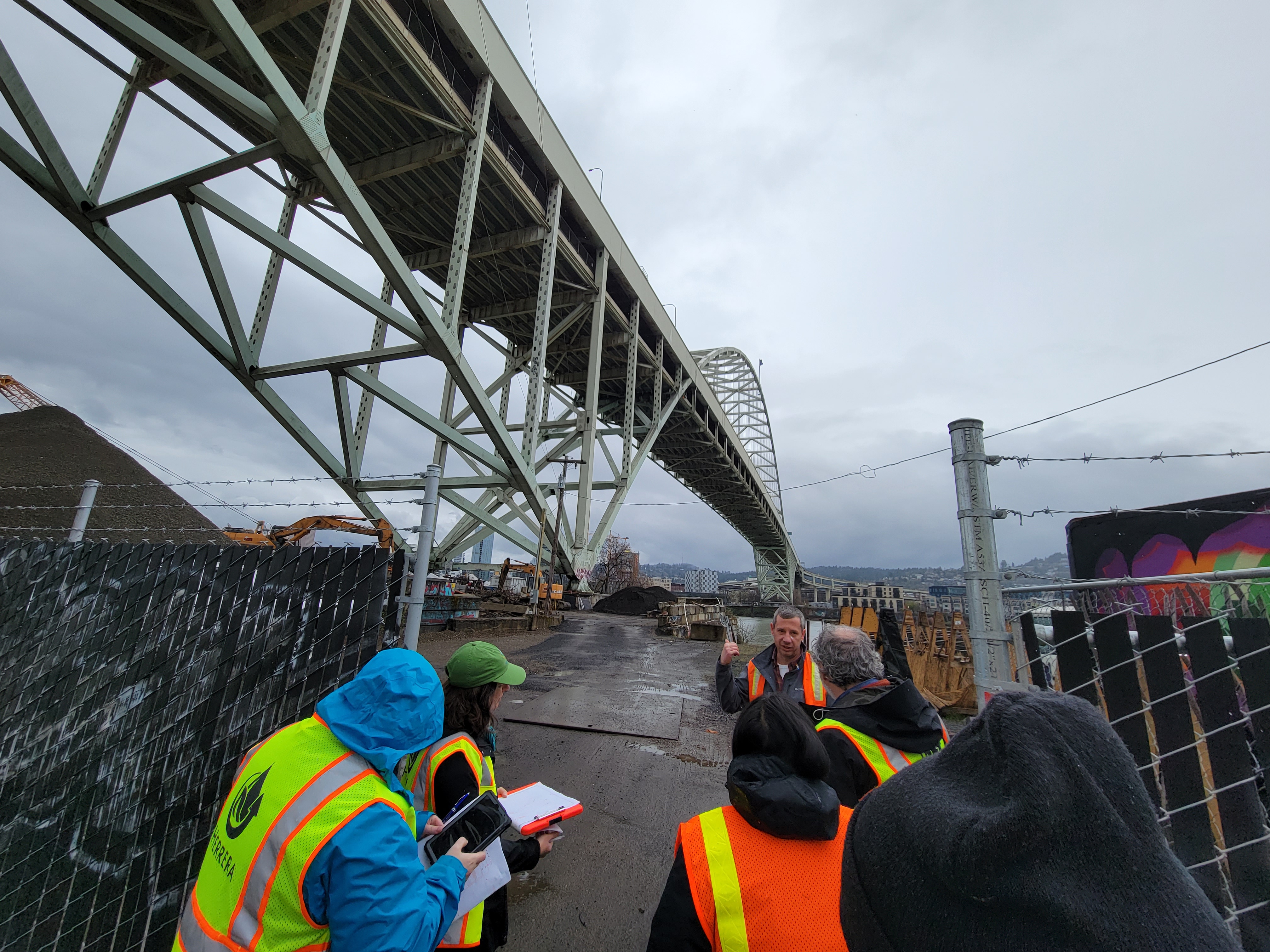 An image of our design team assessing a site at the Fremont Bridge.